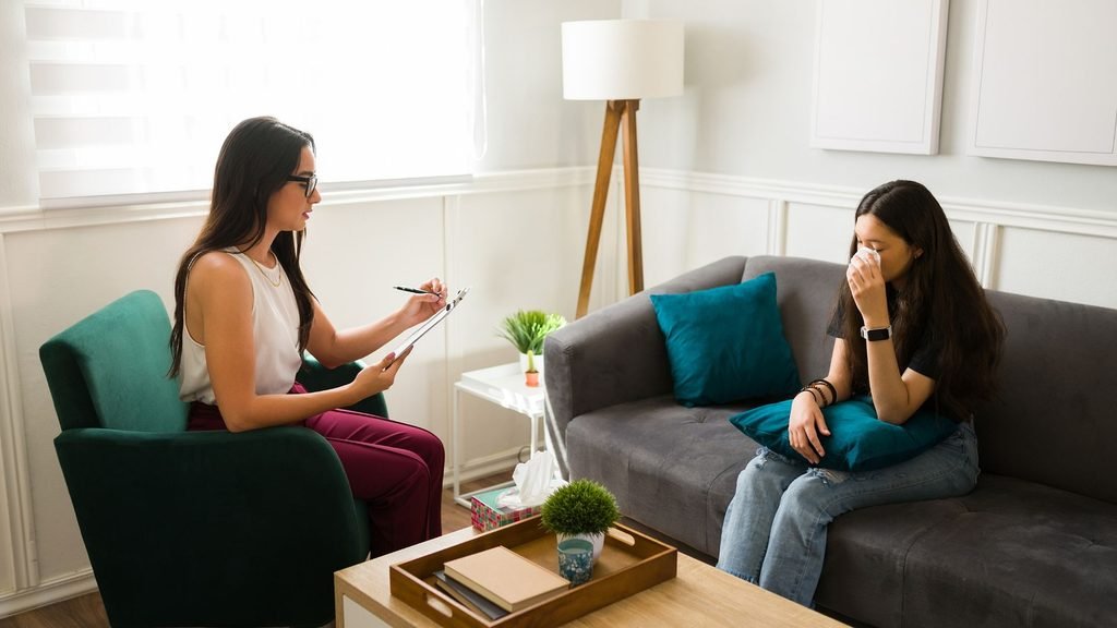Two women in a therapy session.